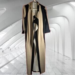 Long open black and tan overcoat. 97 % polyester, 3% spandex. Side pockets. Work